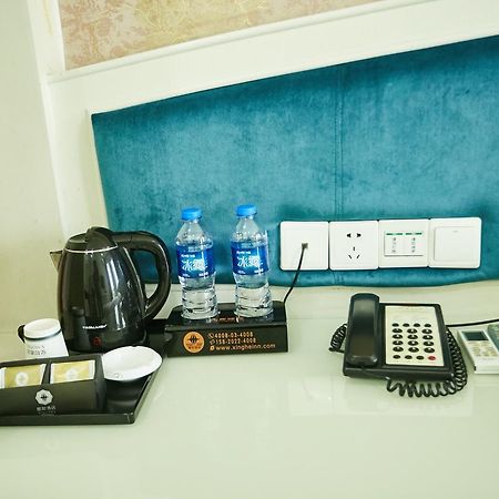 Xinghe Xinfeng Hotel Guangzhou Exteriör bild
