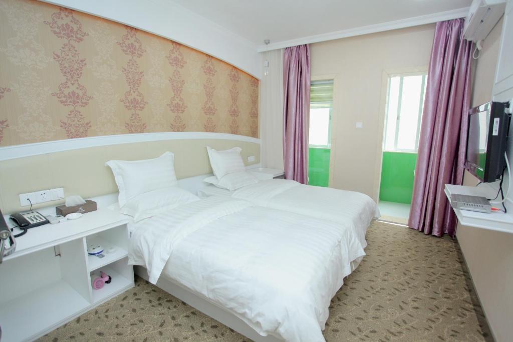 Xinghe Xinfeng Hotel Guangzhou Rum bild