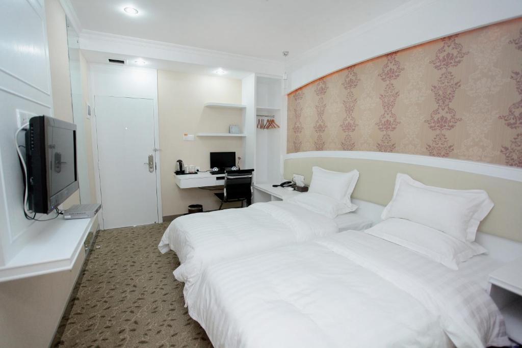 Xinghe Xinfeng Hotel Guangzhou Rum bild