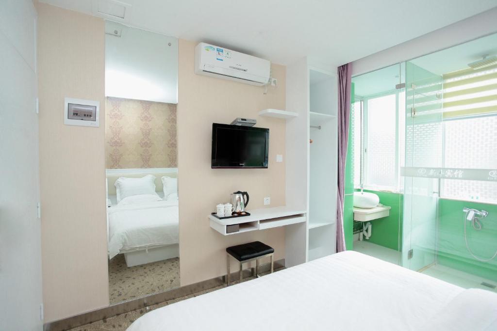 Xinghe Xinfeng Hotel Guangzhou Rum bild