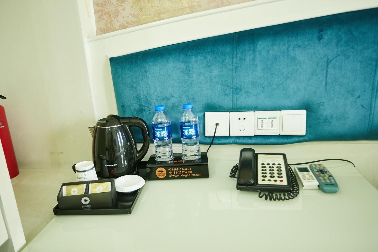 Xinghe Xinfeng Hotel Guangzhou Exteriör bild
